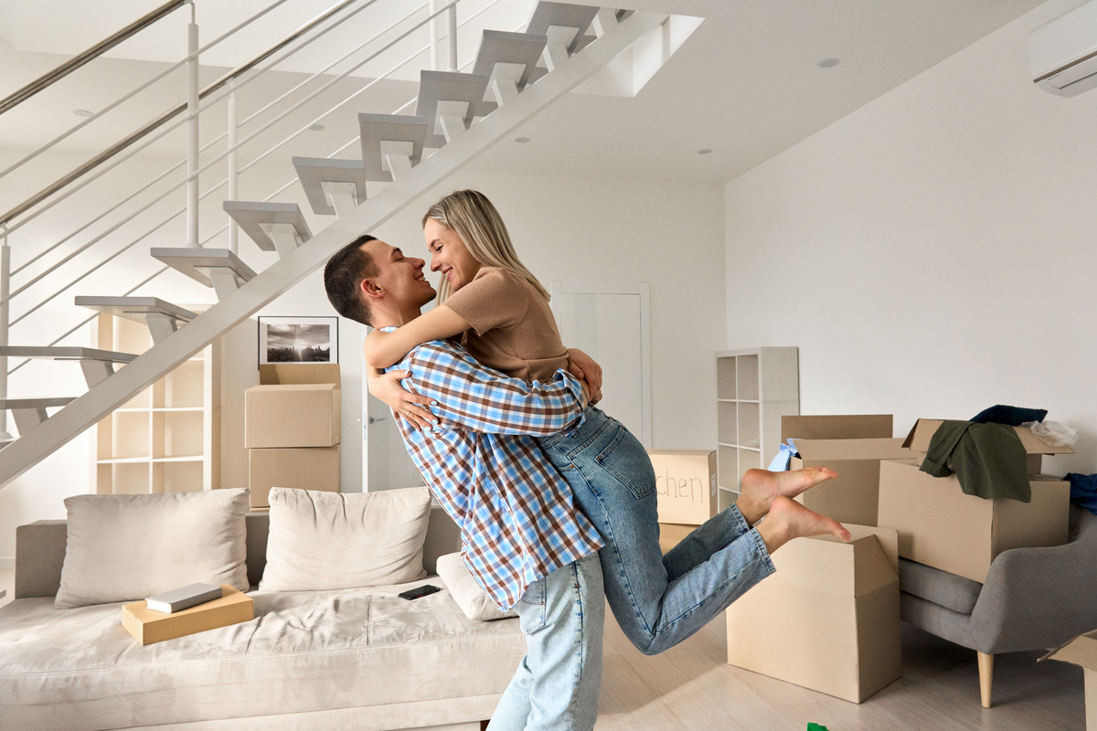 Happy Couple in Moving In Concept
